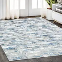 Photo of Navy Blue Abstract Washable Non Skid Area Rug With Fringe