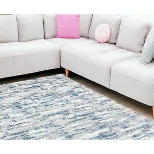 Photo of Navy Blue Abstract Washable Non Skid Area Rug With Fringe