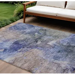 Photo of Navy Blue And Beige Abstract Washable Indoor Outdoor Area Rug