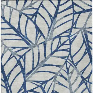 Photo of Navy Blue And Beige Floral Washable Indoor Outdoor Area Rug