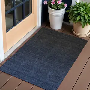 Photo of Navy Blue And Charcoal Abstract Washable Indoor Outdoor Area Rug