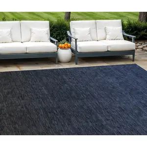 Photo of Navy Blue And Charcoal Abstract Washable Indoor Outdoor Area Rug