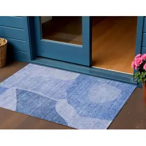 Photo of Navy Blue And Denim Blue Abstract Washable Indoor Outdoor Area Rug