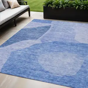 Photo of Navy Blue And Denim Blue Abstract Washable Indoor Outdoor Area Rug