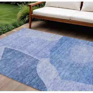 Photo of Navy Blue And Denim Blue Abstract Washable Indoor Outdoor Area Rug