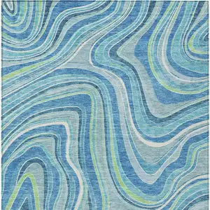 Photo of Navy Blue And Denim Blue Abstract Washable Indoor Outdoor Area Rug