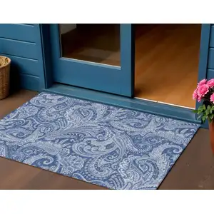 Photo of Navy Blue And Denim Blue Paisley Washable Indoor Outdoor Area Rug