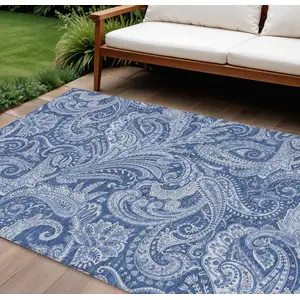 Photo of Navy Blue And Denim Blue Paisley Washable Indoor Outdoor Area Rug