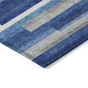 Photo of Navy Blue And Denim Blue Striped Washable Indoor Outdoor Area Rug