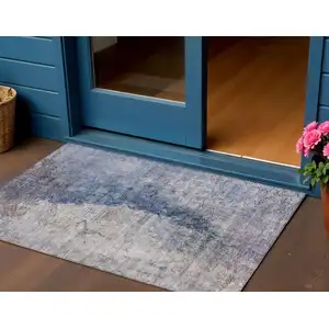 Photo of Navy Blue And Gray Abstract Washable Indoor Outdoor Area Rug