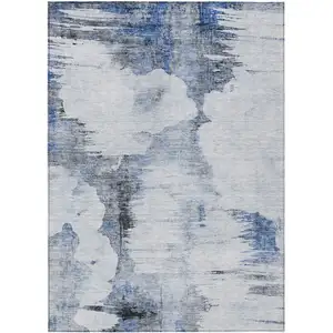 Photo of Navy Blue And Ivory Abstract Washable Indoor Outdoor Area Rug