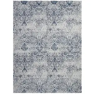 Photo of Navy Blue And Ivory Damask Distressed Area Rug