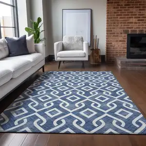 Photo of Navy Blue And Ivory Geometric Washable Indoor Outdoor Area Rug