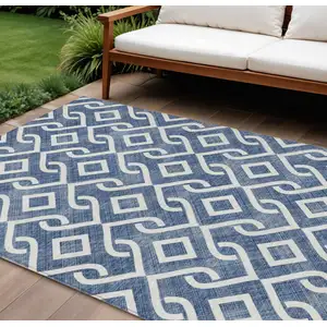 Photo of Navy Blue And Ivory Geometric Washable Indoor Outdoor Area Rug