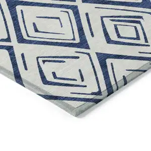 Photo of Navy Blue And Ivory Geometric Washable Indoor Outdoor Area Rug