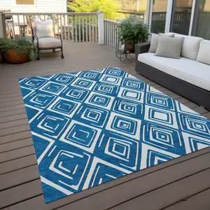 Photo of Navy Blue And Ivory Geometric Washable Indoor Outdoor Area Rug