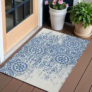 Photo of Navy Blue And Ivory Medallion Washable Indoor Outdoor Area Rug