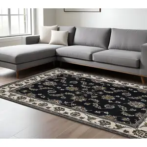 Photo of Navy Blue And Ivory Oriental Area Rug With Fringe