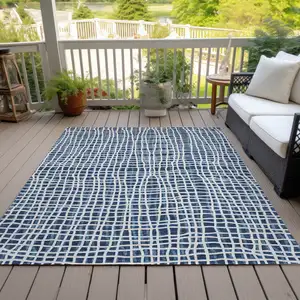 Photo of Navy Blue And Ivory Striped Washable Indoor Outdoor Area Rug