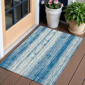 Photo of Navy Blue And Ivory Striped Washable Indoor Outdoor Area Rug