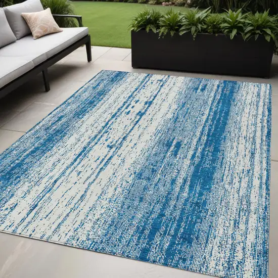 Navy Blue And Ivory Striped Washable Indoor Outdoor Area Rug Photo 1