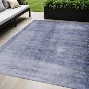 Photo of Navy Blue And Sky Blue Abstract Washable Indoor Outdoor Area Rug