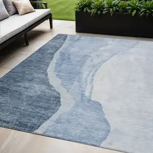 Photo of Navy Blue And Sky Blue Abstract Washable Indoor Outdoor Area Rug