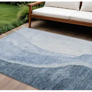 Photo of Navy Blue And Sky Blue Abstract Washable Indoor Outdoor Area Rug