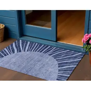 Photo of Navy Blue And Sky Blue Abstract Washable Indoor Outdoor Area Rug