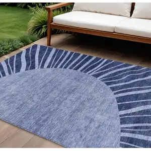 Photo of Navy Blue And Sky Blue Abstract Washable Indoor Outdoor Area Rug