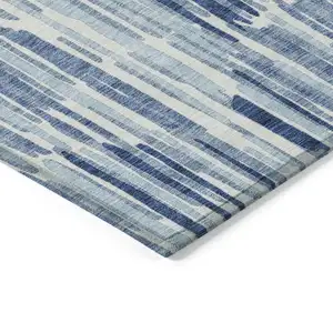 Photo of Navy Blue And Sky Blue Abstract Washable Indoor Outdoor Area Rug