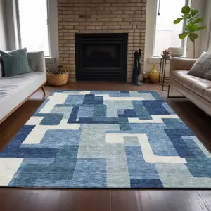 Photo of Navy Blue And Sky Blue Abstract Washable Indoor Outdoor Area Rug