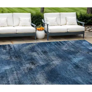 Photo of Navy Blue And Sky Blue Abstract Washable Indoor Outdoor Area Rug