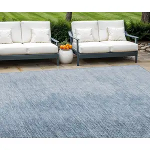 Photo of Navy Blue And Sky Blue Abstract Washable Indoor Outdoor Area Rug