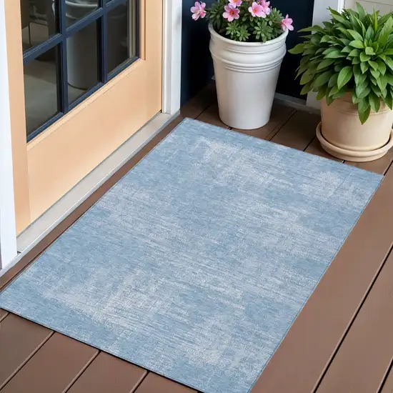 Navy Blue And Sky Blue Abstract Washable Indoor Outdoor Area Rug Photo 1