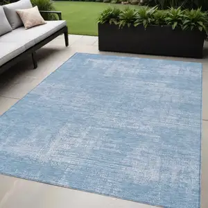 Photo of Navy Blue And Sky Blue Abstract Washable Indoor Outdoor Area Rug