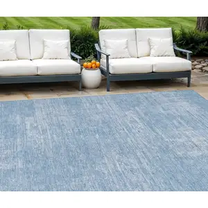 Photo of Navy Blue And Sky Blue Abstract Washable Indoor Outdoor Area Rug