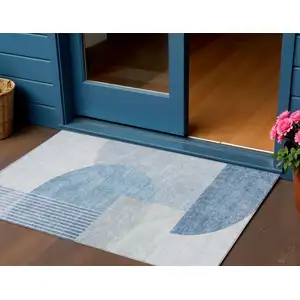 Photo of Navy Blue And Sky Blue Geometric Washable Indoor Outdoor Area Rug