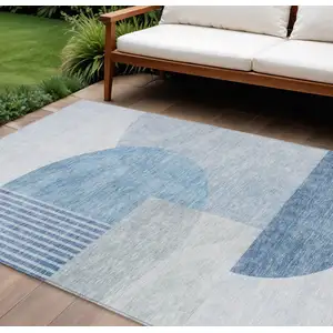 Photo of Navy Blue And Sky Blue Geometric Washable Indoor Outdoor Area Rug