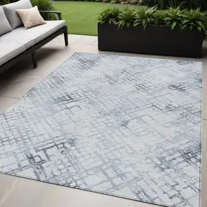 Photo of Navy Blue And Sky Blue Geometric Washable Indoor Outdoor Area Rug