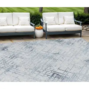 Photo of Navy Blue And Sky Blue Geometric Washable Indoor Outdoor Area Rug