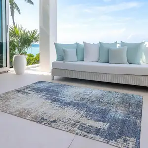 Photo of Navy Blue And Taupe Abstract Washable Indoor Outdoor Area Rug