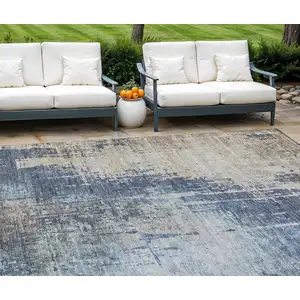 Photo of Navy Blue And Taupe Abstract Washable Indoor Outdoor Area Rug