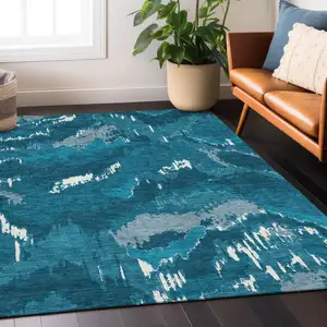 Photo of Navy Blue And Teal Blue Abstract Washable Indoor Outdoor Area Rug