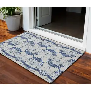 Photo of Navy Blue Beige And Denim Blue Oriental Washable Indoor Outdoor Area Rug