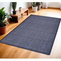 Photo of Navy Blue Geometric Power Loom Washable Non Skid Area Rug