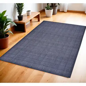 Photo of Navy Blue Geometric Power Loom Washable Non Skid Area Rug