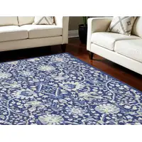 Photo of Navy Blue Ivory and Beige Floral Distressed Non Skid Area Rug