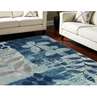 Photo of Navy Blue Light Blue and Gray Botanical Leaves Area Rug