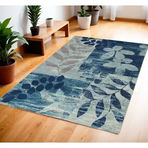 Photo of Navy Blue Light Blue and Gray Botanical Leaves Area Rug